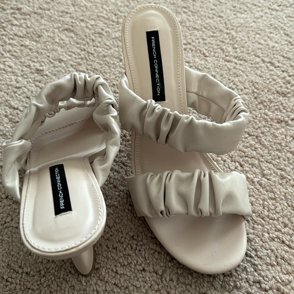 French connection mules.  Nude.